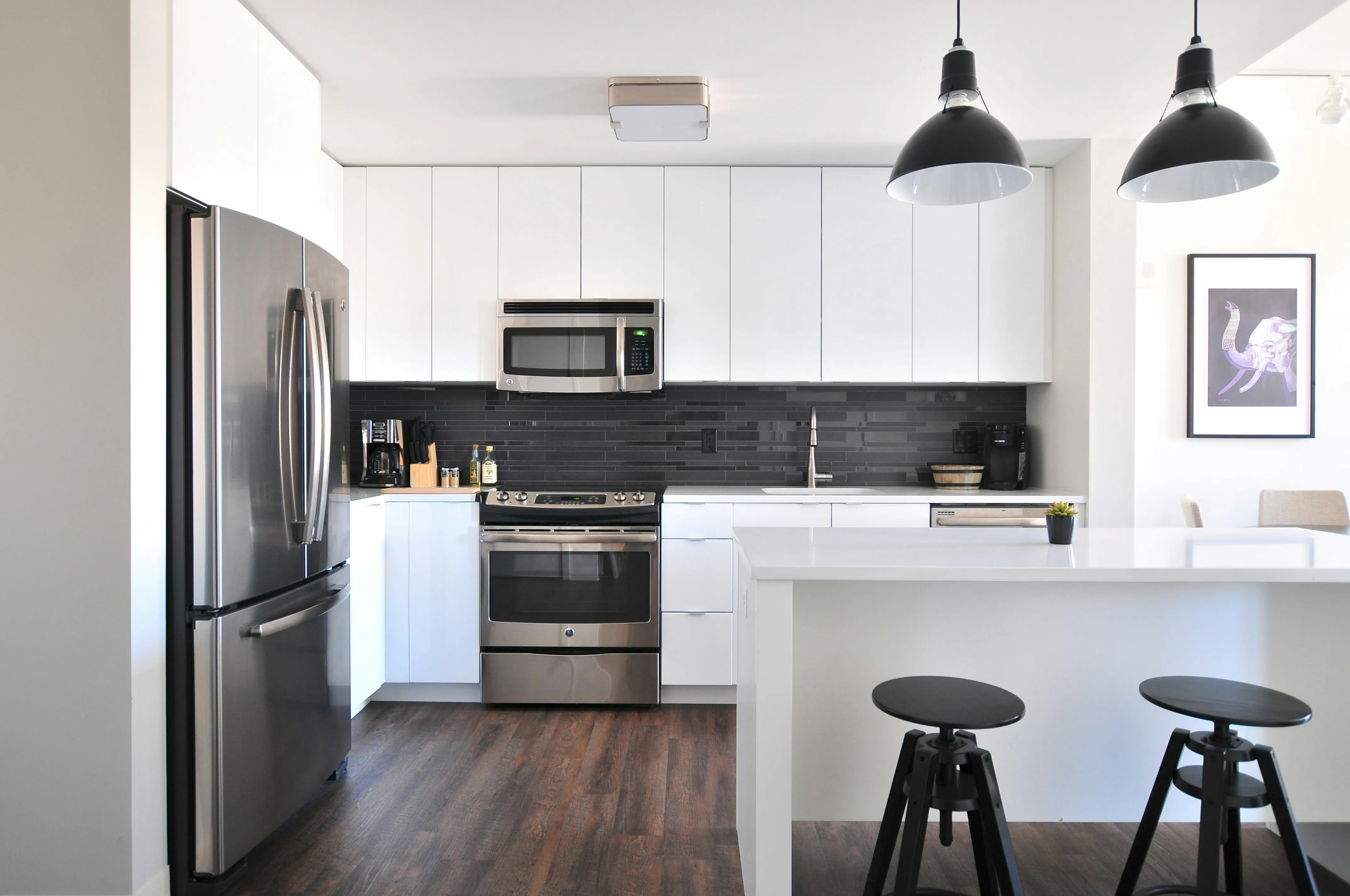 Newly finished kitchen with clean cabinets and counters